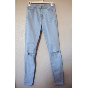 Light Wash Ripped High Rise Jeggings